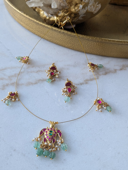 Regal Kundan Necklace Set with Gemstone Accents
