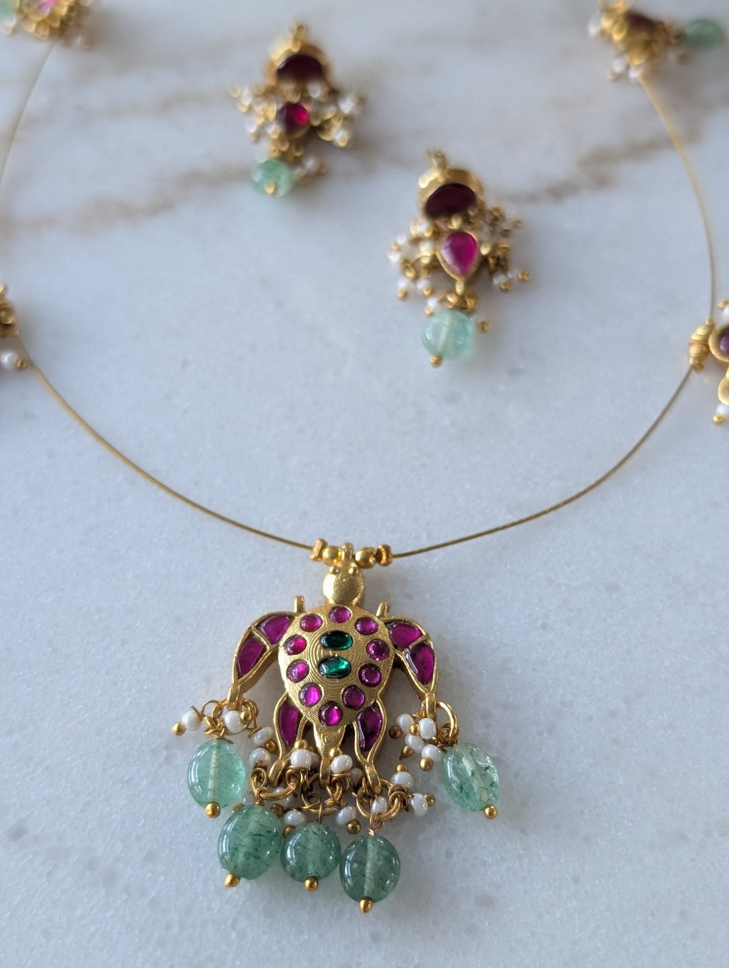 Regal Kundan Necklace Set with Gemstone Accents